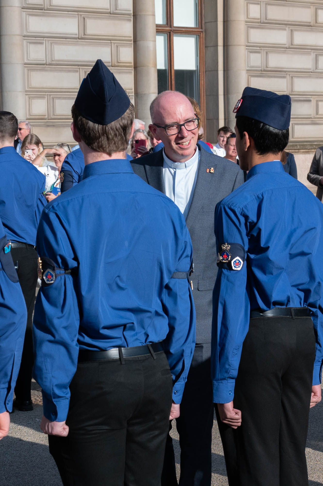 Rev Stewart Cutler talks to the Queen's Men as he inspects them outside Glasgow City Chambers